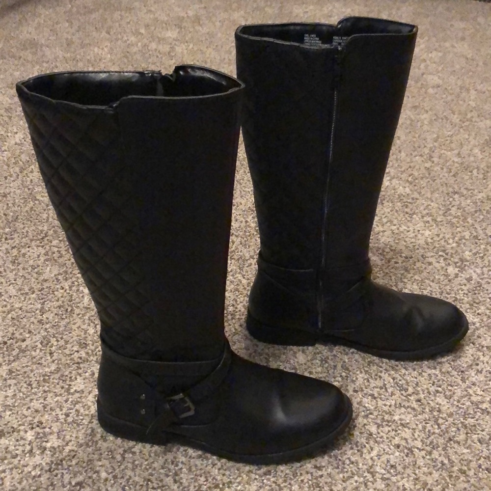 Tall black quilted riding boots